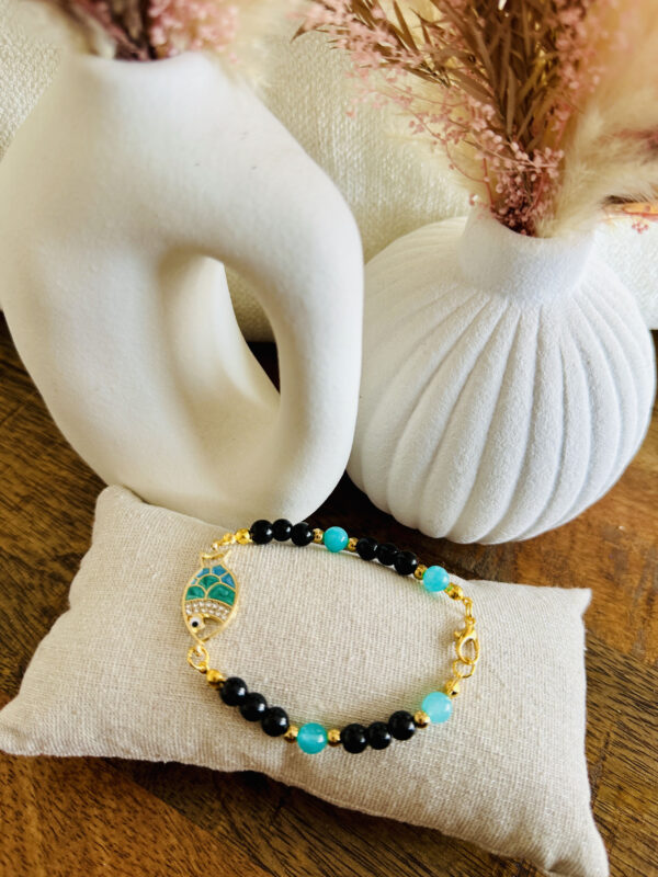 Bracelet breloque poisson turquoise